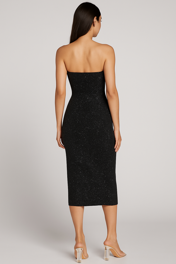 Black strapless dress worn by a model on a light gray background