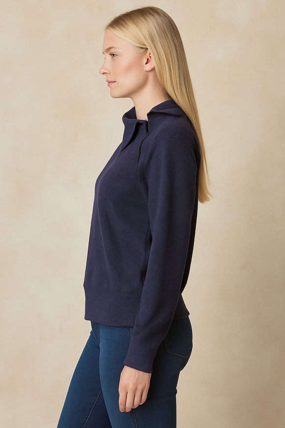 Side view of blonde model in navy pullover sweater, casual chic knitwear for everyday wear