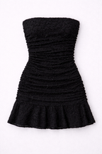 Black strapless dress with ruched bodice and flared skirt on a white background