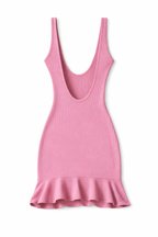 Pink dress with ruffled hem on a white background