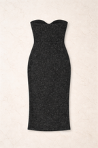 Black strapless dress on a beige background