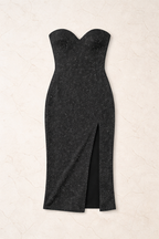 Black strapless dress with a slit on a beige background