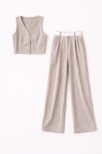 Light brown vest and wide-leg pants on a white background