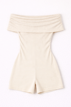 Beige strapless romper on a white background
